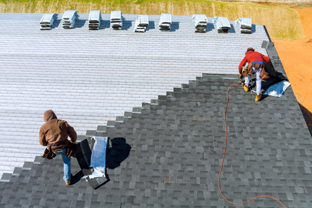 Roofers putting on a roof